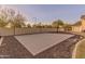 Backyard features a full basketball court, perfect for recreation and outdoor activities at 1409 E Dove Pl, Casa Grande, AZ 85122