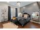 Chic bedroom boasts a dark color scheme, elegant decor, and a cozy faux fur rug for added comfort at 1409 E Dove Pl, Casa Grande, AZ 85122