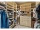 Custom walk-in closet with shelves and drawers for optimal storage at 1409 E Dove Pl, Casa Grande, AZ 85122