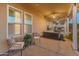 Spacious covered patio with ample seating options and a view of the backyard and pool at 1409 E Dove Pl, Casa Grande, AZ 85122