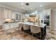 Spacious kitchen with a large center island, pendant lights, and stainless steel appliances at 1409 E Dove Pl, Casa Grande, AZ 85122