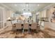 Spacious kitchen with granite countertops, stainless steel appliances and open floorplan to dining area at 1409 E Dove Pl, Casa Grande, AZ 85122