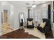 Bright main bedroom with seating area and access to ensuite bathroom at 1409 E Dove Pl, Casa Grande, AZ 85122