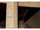Entrance to apartment complex showcases unit numbers and outdoor stairway at 151 E Broadway Rd # 210, Tempe, AZ 85282