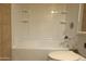 Bathroom featuring a clean white tub and toilet at 151 E Broadway Rd # 210, Tempe, AZ 85282