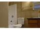 Tiled bathroom featuring a shower-tub combination at 151 E Broadway Rd # 210, Tempe, AZ 85282