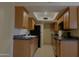 Modern kitchen features granite countertops, ample cabinet space, and recessed lighting at 151 E Broadway Rd # 210, Tempe, AZ 85282