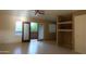Light-filled living room with tile floors and balcony access, perfect for relaxing at 151 E Broadway Rd # 210, Tempe, AZ 85282