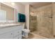 Bathroom featuring a glass enclosed tile shower at 17205 N 107Th Ave, Sun City, AZ 85373