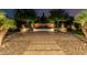 Find ultimate relaxation with this backyard water feature, mature landscaping, and brick pavers at 1725 E Everglade Ln, Gilbert, AZ 85298