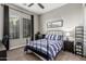 This cozy bedroom features a large window, carpeted floors and is ready to be enjoyed at 1725 E Everglade Ln, Gilbert, AZ 85298