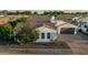 Beautiful single-Gathering home with a tile roof, desert landscaping, and a spacious three-car garage at 1725 E Everglade Ln, Gilbert, AZ 85298