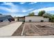 Charming single story home featuring a front yard with desert landscaping at 1939 E Alameda Dr, Tempe, AZ 85282