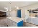 Bright kitchen with white cabinets, stainless appliances, and stylish island at 1939 E Alameda Dr, Tempe, AZ 85282