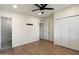 Spacious main bedroom with walk-in closet, ceiling fan and attached bathroom at 1939 E Alameda Dr, Tempe, AZ 85282