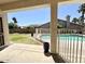 View of the backyard showcasing a pool, green lawn, plants and fenced area, perfect for relaxation and entertainment at 20906 N 56Th Dr, Glendale, AZ 85308