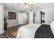 Bedroom boasting ample natural light and neutral walls, leading to bathroom and closet at 2121 W Union Hills Dr # 113, Phoenix, AZ 85027