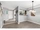 Open dining area adjacent to the kitchen, creating a seamless flow for entertaining at 2121 W Union Hills Dr # 113, Phoenix, AZ 85027