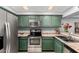 Well-equipped kitchen featuring modern appliances and ample cabinet space at 2121 W Union Hills Dr # 113, Phoenix, AZ 85027