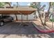Assigned covered parking for condo owners, with clearly marked spaces at 2121 W Union Hills Dr # 113, Phoenix, AZ 85027