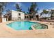 Community pool with refreshing turquoise water, tanning deck, and nearby spa at 2121 W Union Hills Dr # 113, Phoenix, AZ 85027