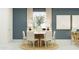 Elegant dining room with stylish round table, comfortable chairs, and contemporary decor at 23178 W Marguerite Ave, Buckeye, AZ 85326
