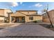 Home exterior featuring a large patio, landscaping, and a basketball court for outdoor enjoyment at 2324 W Melody Dr, Phoenix, AZ 85041