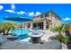 Beautiful pool and fire pit area, perfect for outdoor entertaining, along with a basketball court and grilling area at 2387 E Runaway Bay Pl, Gilbert, AZ 85298