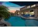 Beautiful backyard pool and lounge area for relaxing and outdoor entertaining. Grilling area and basketball court also included at 2387 E Runaway Bay Pl, Gilbert, AZ 85298