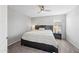 Bedroom featuring a ceiling fan, carpeted floors, and a large bed with bedside tables at 2387 E Runaway Bay Pl, Gilbert, AZ 85298