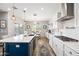 Bright kitchen featuring a spacious island, modern fixtures, and plenty of cabinet space at 2387 E Runaway Bay Pl, Gilbert, AZ 85298