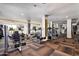 A well-equipped gym featuring modern treadmills, weight machines, and exercise equipment at 2511 W Queen Creek Rd # 174, Chandler, AZ 85248