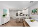 Modern kitchen featuring white cabinetry, stainless steel appliances, and an open layout at 2511 W Queen Creek Rd # 174, Chandler, AZ 85248