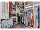 Walk-in closet with custom shelving, hanging rods and storage at 2511 W Queen Creek Rd # 174, Chandler, AZ 85248