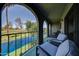 Relax on this charming balcony overlooking the community waterway and manicured greenery at 2524 S El Paradiso Dr # 82, Mesa, AZ 85202