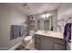 Neutral bathroom featuring gray vanity, shelving, and coordinating towels for a modern appeal at 2524 S El Paradiso Dr # 82, Mesa, AZ 85202