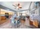 Open dining area with ceiling fan and view of the kitchen and living space at 2524 S El Paradiso Dr # 82, Mesa, AZ 85202