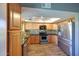 Updated kitchen with stainless steel appliances, tile backsplash, and modern cabinets offer great functionality at 2524 S El Paradiso Dr # 82, Mesa, AZ 85202