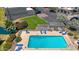 An aerial view capturing a sparkling pool area with lounge chairs for ultimate relaxation and enjoyment at 2524 S El Paradiso Dr # 82, Mesa, AZ 85202