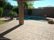 Backyard featuring a covered patio and a swimming pool at 26449 N 84Th Dr, Peoria, AZ 85383