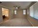 Spacious main bedroom with carpet and ceiling fan at 26449 N 84Th Dr, Peoria, AZ 85383