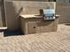 Outdoor kitchen area with built-in grill and concrete counter at 26449 N 84Th Dr, Peoria, AZ 85383