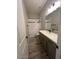 Bathroom featuring a tub, vanity with storage, and a large mirror at 3248 W San Cristobal Rd, San Tan Valley, AZ 85144