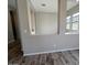 Bright living area featuring a partial wall and large windows offering plenty of natural light at 3248 W San Cristobal Rd, San Tan Valley, AZ 85144