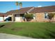 Charming single-story brick home featuring manicured lawn, attached garage and a welcoming front entrance at 3730 W North Ln, Phoenix, AZ 85051
