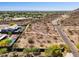 Aerial view of vacant land surrounded by beautiful homes and lush greenery at 3911 W Oraibi Dr # 6, Glendale, AZ 85308