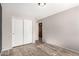 Bedroom featuring wood floors and a closet for storage at 4214 W Marco Polo Rd, Glendale, AZ 85308