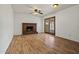 Inviting living room showcasing a fireplace and a ceiling fan at 4346 W Mescal St, Glendale, AZ 85304