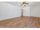 Large living room featuring wood-like floors, ceiling fan, and natural light, ready for personalization at 4346 W Mescal St, Glendale, AZ 85304