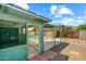 Backyard showcasing covered patio and view of fenced pool area at 4346 W Mescal St, Glendale, AZ 85304